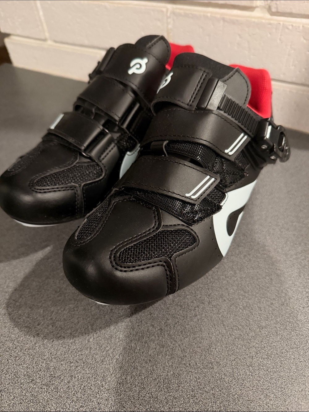 Peloton Black Cycling Shoes with Red Lining and Light Blue Accents